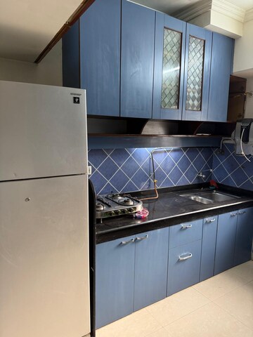 Kitchen in 2 BHK Apartment at Pranay Classic Apartment, Bandra West – for Rent