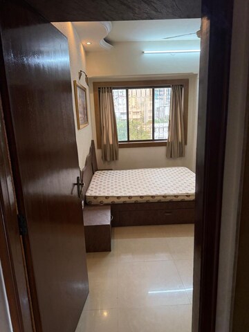 Living Room in 2 BHK Apartment at Pranay Classic Apartment, Bandra West – for Rent
