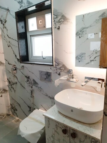 Bathroom in 3 BHK Apartment at Surya CGHS, Sector 43 – for Sale