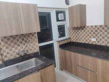 Kitchen in 3 BHK Apartment at Adani Oyster Grande Phase 2, Sector 102 – for Rent