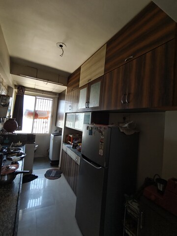Kitchen in 3 BHK Apartment at Sahaj Solarium, Vasna – for Rent