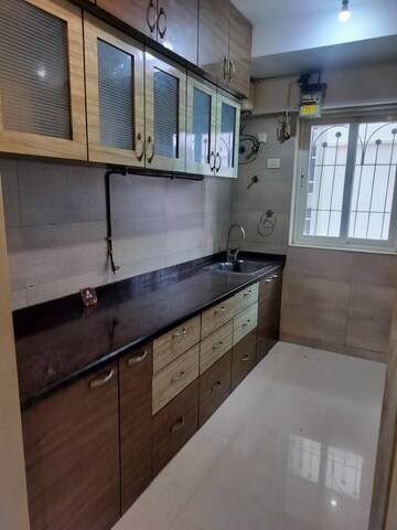 Kitchen in 2 BHK Apartment at Eskay Itus Apartment, Andheri West – for Rent