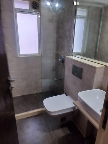 Bathroom in 2 BHK Apartment at Eskay Itus Apartment, Andheri West – for Rent