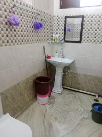 Bathroom in 1.5 BHK Builder Floor at Huda – for Rent