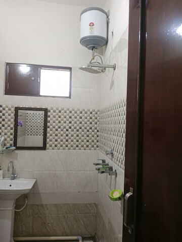 Bathroom in 1.5 BHK Builder Floor at Huda – for Rent