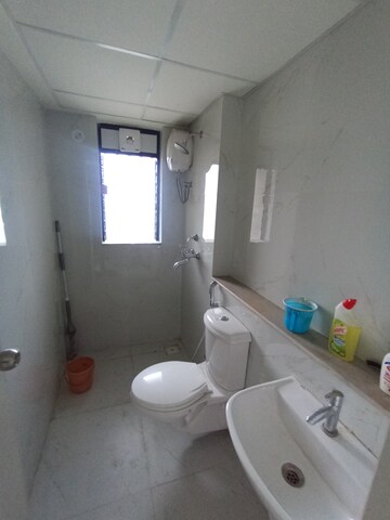 Bathroom in 1 BHK Apartment at Runwal Gardens Phase I, Dombivli East – for Rent