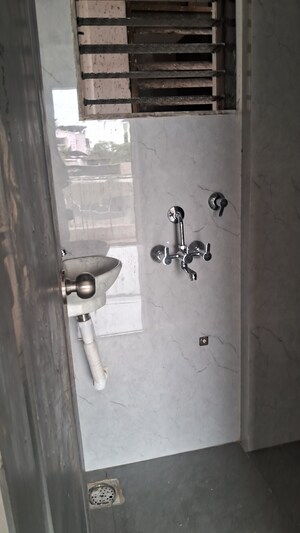 Bathroom in 2.5 BHK Apartment at Nav shree Ambika Darshan, Kalyan West – for Sale