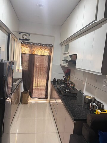 Kitchen in 3 BHK Apartment at Gulshan Ikebana, Sector 143 – for Rent