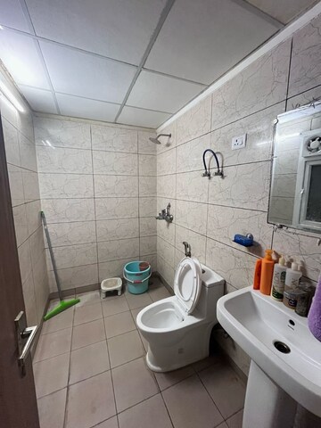 Bathroom in 3 BHK Apartment at Gulshan Ikebana, Sector 143 – for Rent