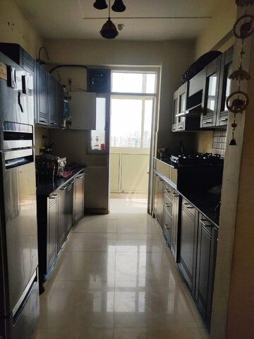 Kitchen in 4 BHK Apartment at Prateek Wisteria, Sector 77 – for Rent