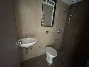 Bathroom in 2 BHK Apartment at Mahavir Kalpavruksha, Ghodbunder Road – for Sale