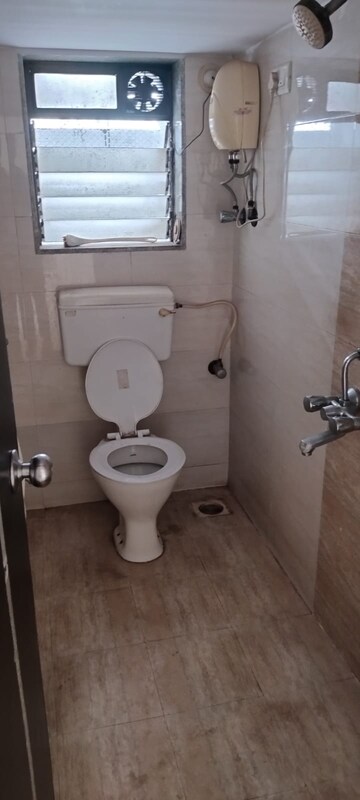 Bathroom in 2 BHK Apartment at Omkar Signet, Malad East – for Rent