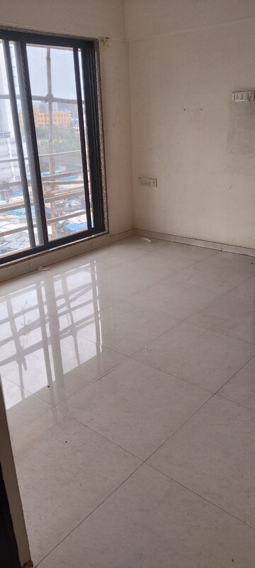 Bedroom in 2 BHK Apartment at Omkar Signet, Malad East – for Rent