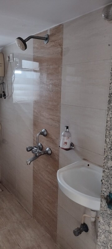 Bathroom in 2 BHK Apartment at Omkar Signet, Malad East – for Rent