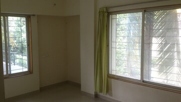 Bedroom in 4 BHK Apartment at Belvalkar Kalpak CHS, Dahanukar Colony – for Rent