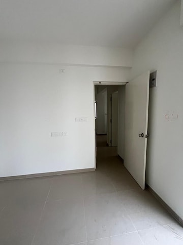 Room in 2 BHK Apartment at Peninsula Center, Gahunje – for Rent