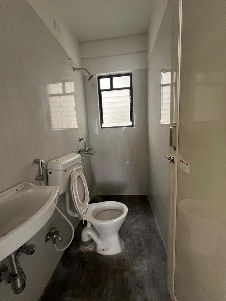 Bathroom, peninsula-center 2 Bedroom 620 Sq.Ft. Apartment In Gahunje Pune 8999990