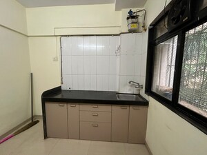 Kitchen in 1 BHK Apartment at Vijay Vatika, Kavesar – for Sale