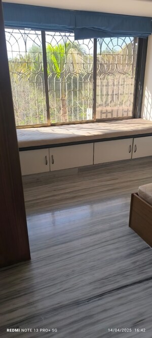 Room in 2 BHK Apartment at Kumar Harshvardhan CHS, Andheri West – for Sale