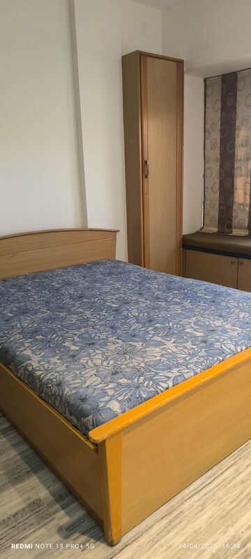 Bedroom in 2 BHK Apartment at Kumar Harshvardhan CHS, Andheri West – for Sale