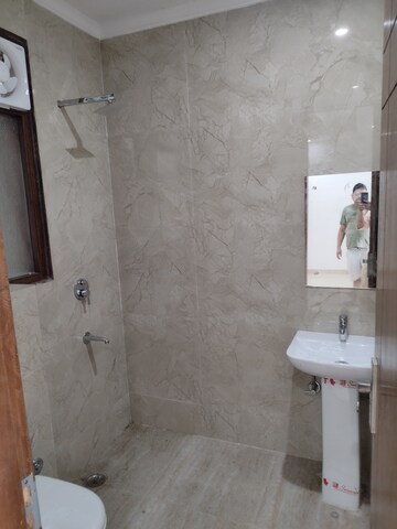 Bathroom in 3 BHK Builder Floor at Freedom Fighters Enclave – for Rent