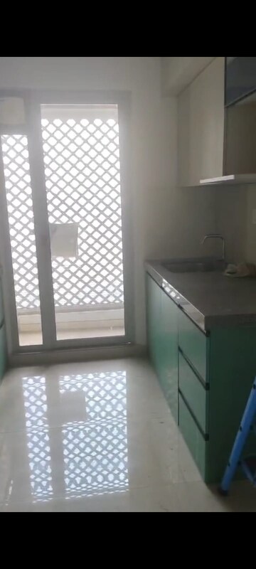 Kitchen in 2 BHK Apartment at Piramal Vaikunth, Balkum Pada – for Rent