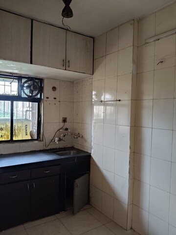 Kitchen in 1 BHK Apartment at Millennium Tower, Kandivali East – for Rent