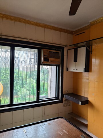 Living Room in 1 BHK Apartment at Millennium Tower, Kandivali East – for Rent