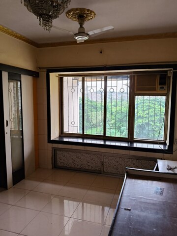 Bedroom in 1 BHK Apartment at Millennium Tower, Kandivali East – for Rent