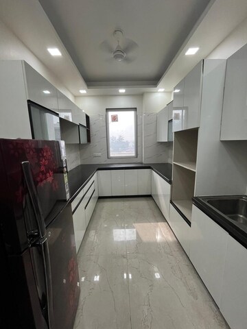 Kitchen in 3 BHK Apartment at Adani M2K Oyster Grande, Sector 102 – for Rent
