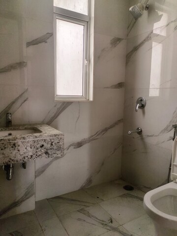 Bathroom in 2.5 BHK Builder Floor at Smart World Gems, Sector 89 – for Rent
