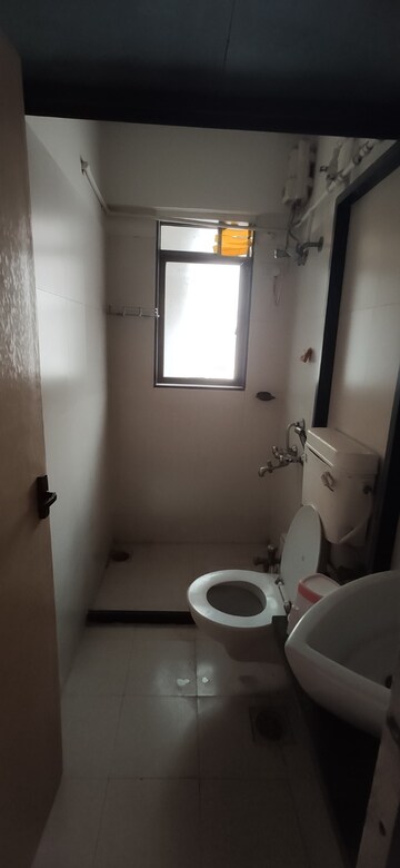 Bathroom in 1 BHK Apartment at Poonam Vaishno Heights, Malad East – for Rent