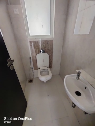 Bathroom in 1 BHK Apartment at Puranik Hometown, Ghodbunder Road – for Rent