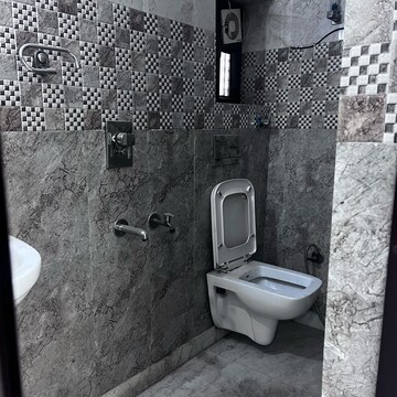 Bathroom in 2 BHK Apartment at Surya Kiran CGHS, Vikas Puri – for Rent