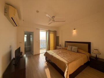 Bedroom in 3 BHK Builder Floor at DLF Park Place, Sector 54 – for Rent