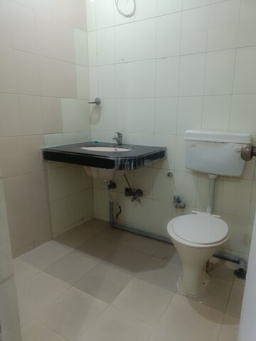 Bathroom in 1 RK Apartment at Royal Palms Piccadilly Condos, Goregaon East – for Rent