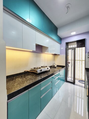 Kitchen in 1 BHK Apartment at Runwal My City Phase II Cluster 05, Dombivli East – for Rent