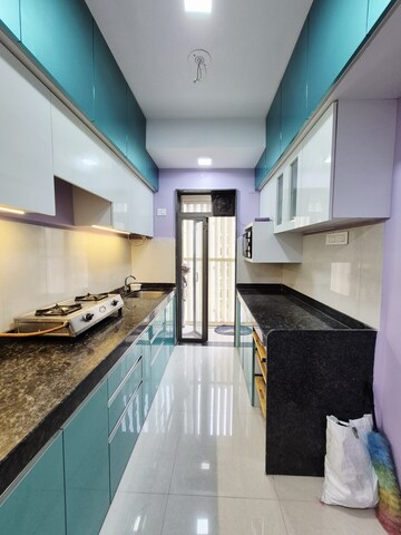 Kitchen in 1 BHK Apartment at Runwal My City Phase II Cluster 05, Dombivli East – for Rent