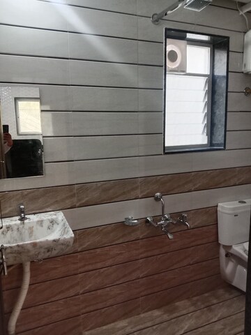 Bathroom in 2 BHK Apartment at Mantri Aangan, Koregaon Park – for Rent