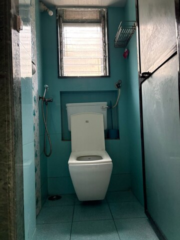 Bathroom in 1 BHK Apartment at The Kamal Sagar CHS, Bhandup East – for Rent