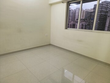 Room in 2 BHK Apartment at Omkar Signet, Malad East – for Rent