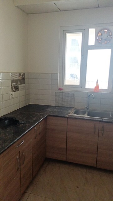 Kitchen in 2 BHK Apartment at Gaur City 7th Avenue, Sector 4 Greater Noida – for Rent