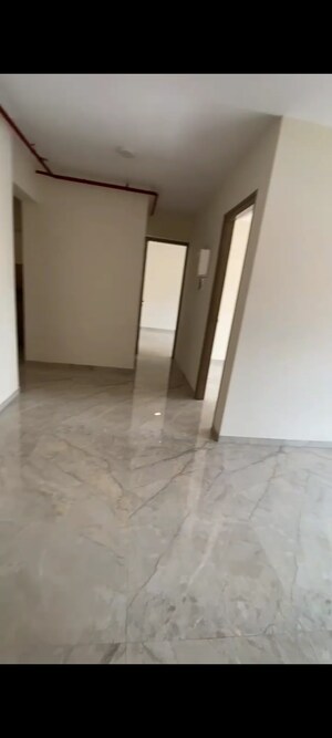 Room in 2 BHK Apartment at Ajmera Boulevard, Malad West – for Sale