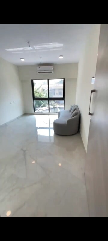 Living Room in 2 BHK Apartment at Ajmera Boulevard, Malad West – for Sale