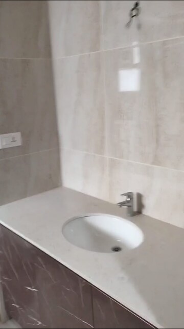 Bathroom in 4 BHK Apartment at Avenue Road – for Sale