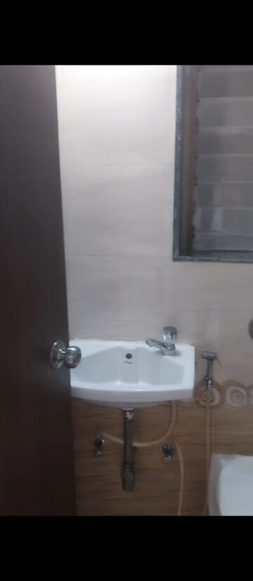 Bathroom in 1 BHK Apartment at Sethia Sea View, Goregaon West – for Rent