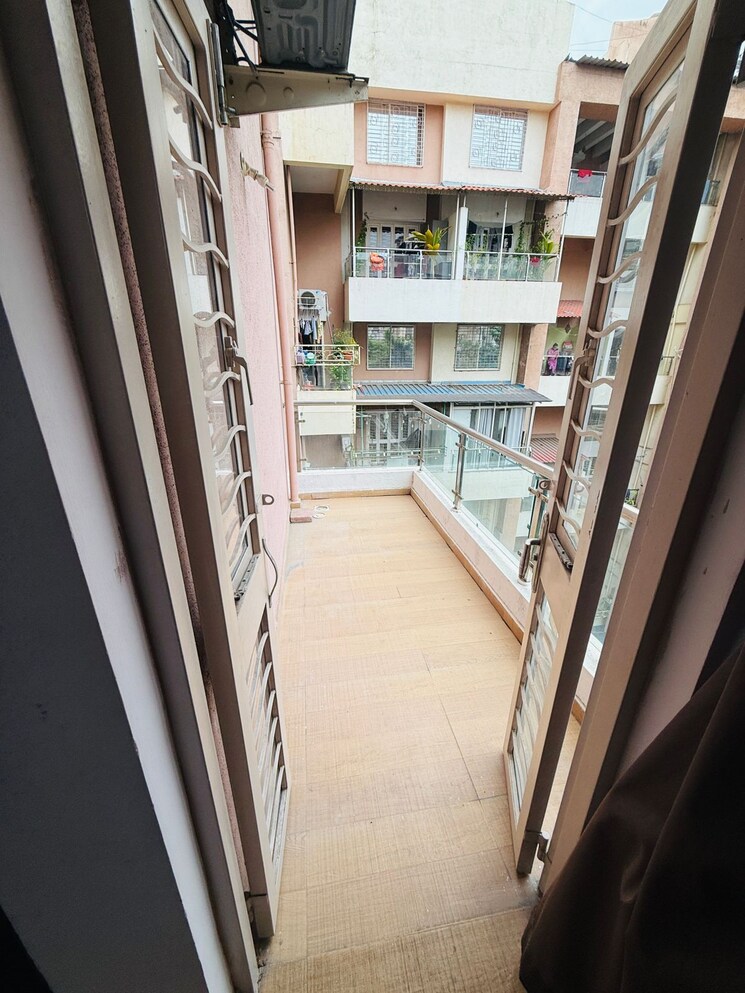 Balcony, gk-peace-valley 2 Bedroom 800 Sq.Ft. Apartment In Pimple Saudagar Pune 9001046