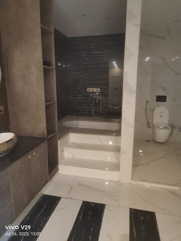 Bathroom in 4 BHK Apartment at DLF The Camellias, Sector 42 – for Sale