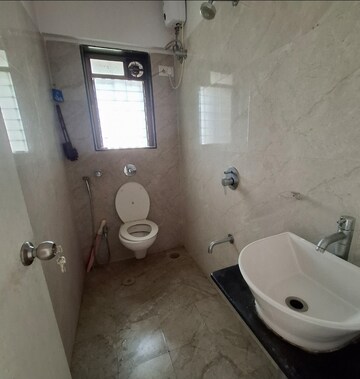 Bathroom in 1 BHK Apartment at Tirupathi The Windsor, Kandivali East – for Rent