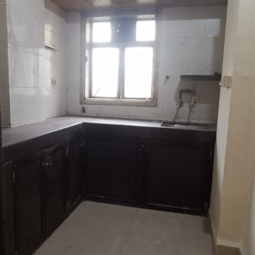Kitchen in 2 BHK Apartment at Eden Rose Apartment, Kanakia Road – for Rent